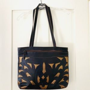 Large leaders in leather handbag handmade with detail